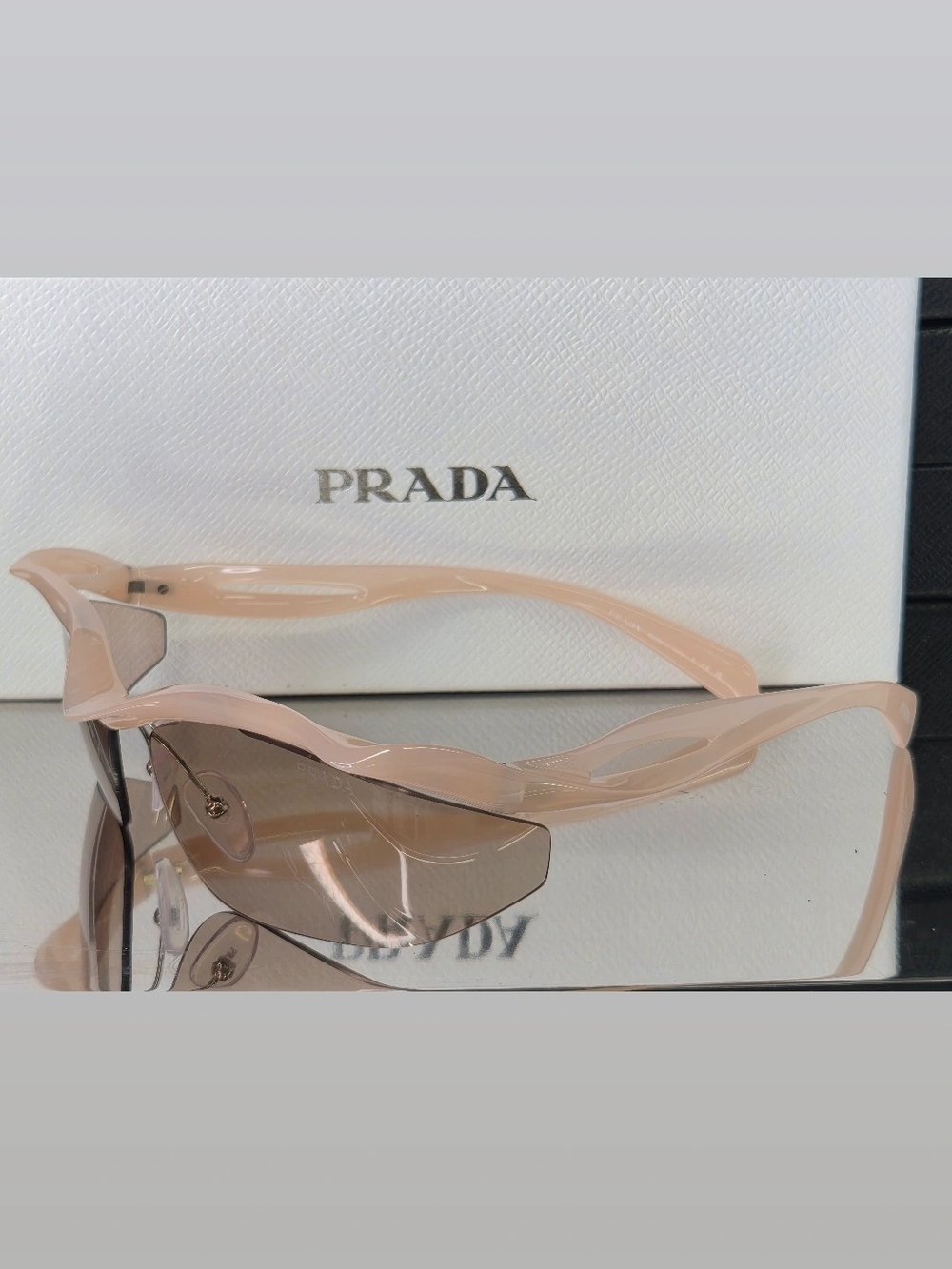 PRADA Women's Pink Rimless Sunglasses